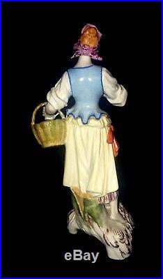 Antique Royal Porcelain KPM figurine of Lady with basket and mug