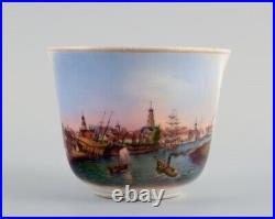 KPM, Berlin. Antiqu cup in overglaze, hand painted with city motif from Leere
