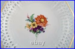 KPM, Berlin. Antique plate /bowl in openwork porcelain with hand-painted flowers