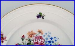 KPM, Berlin. Two antique porcelain plates with hand-painted flower baskets