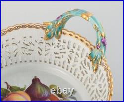 KPM, Germany. Large impressive and openwork bowl hand-painted with fruits