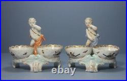 Pair of Antique KPM Berlin Porcelain Figural Salt stands with Putti